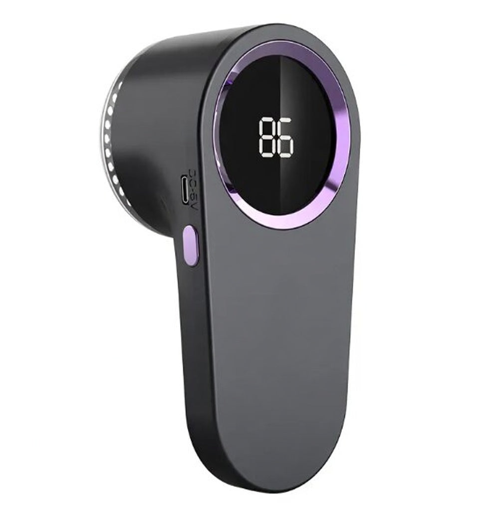 Rechargeable fabric shaver for removing lint and fuzz from clothing