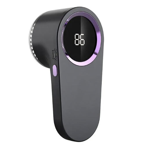 Rechargeable fabric shaver for removing lint and fuzz from clothing